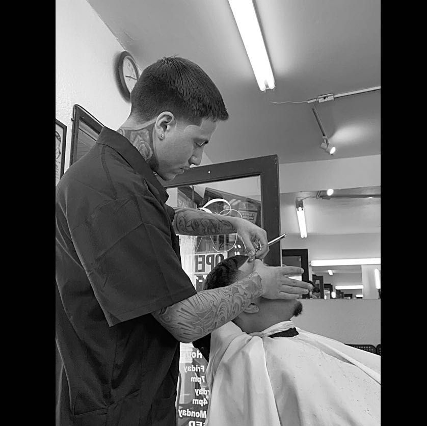 Corey Mcalister (Creations Barbershop)